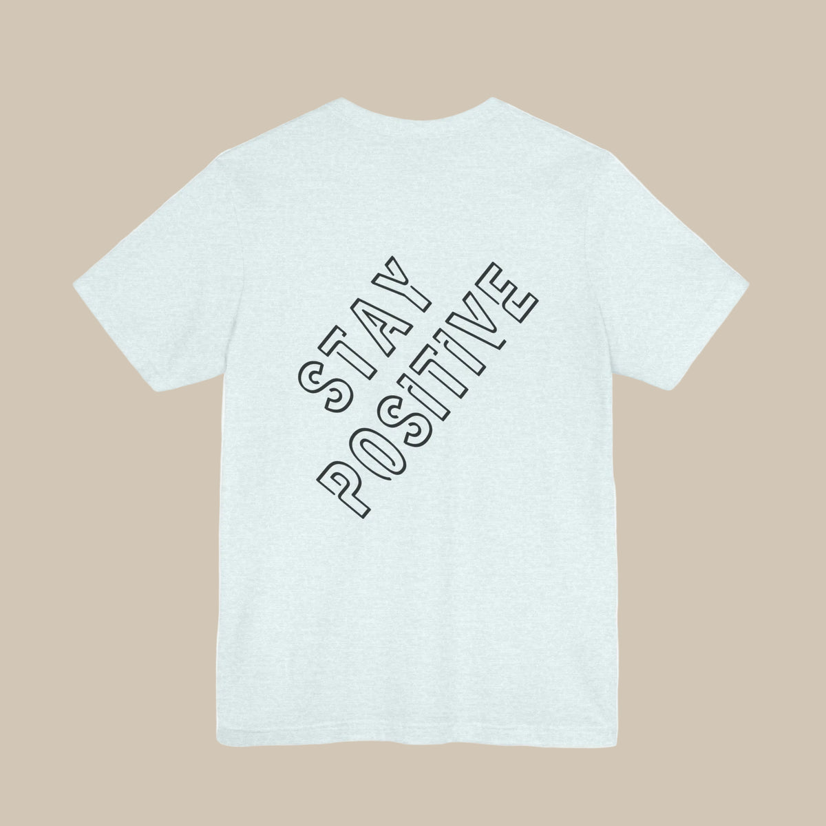 Light blue t-shirt with 'Stay Positive' backprint text on a light blue background