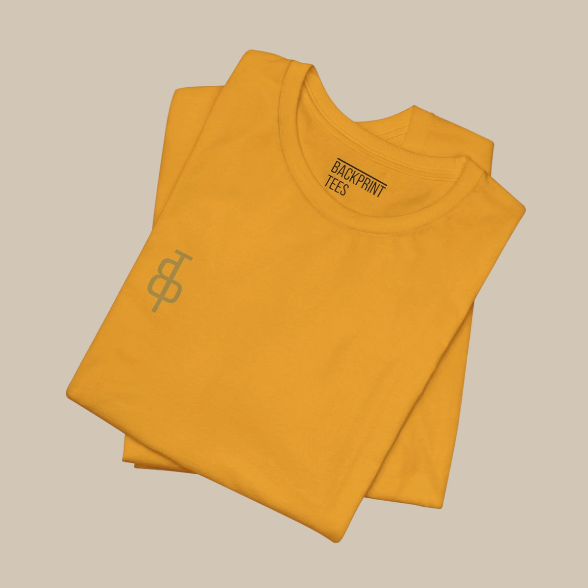 Folded mustard yellow t-shirt with a logo on a yellow background