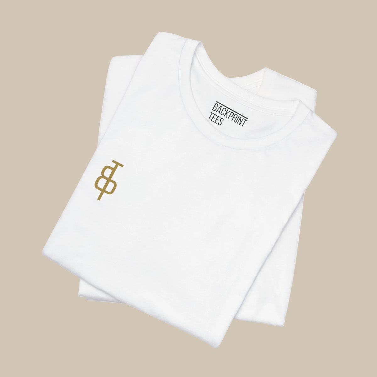 White t-shirt with a gold logo and rose design on a white background