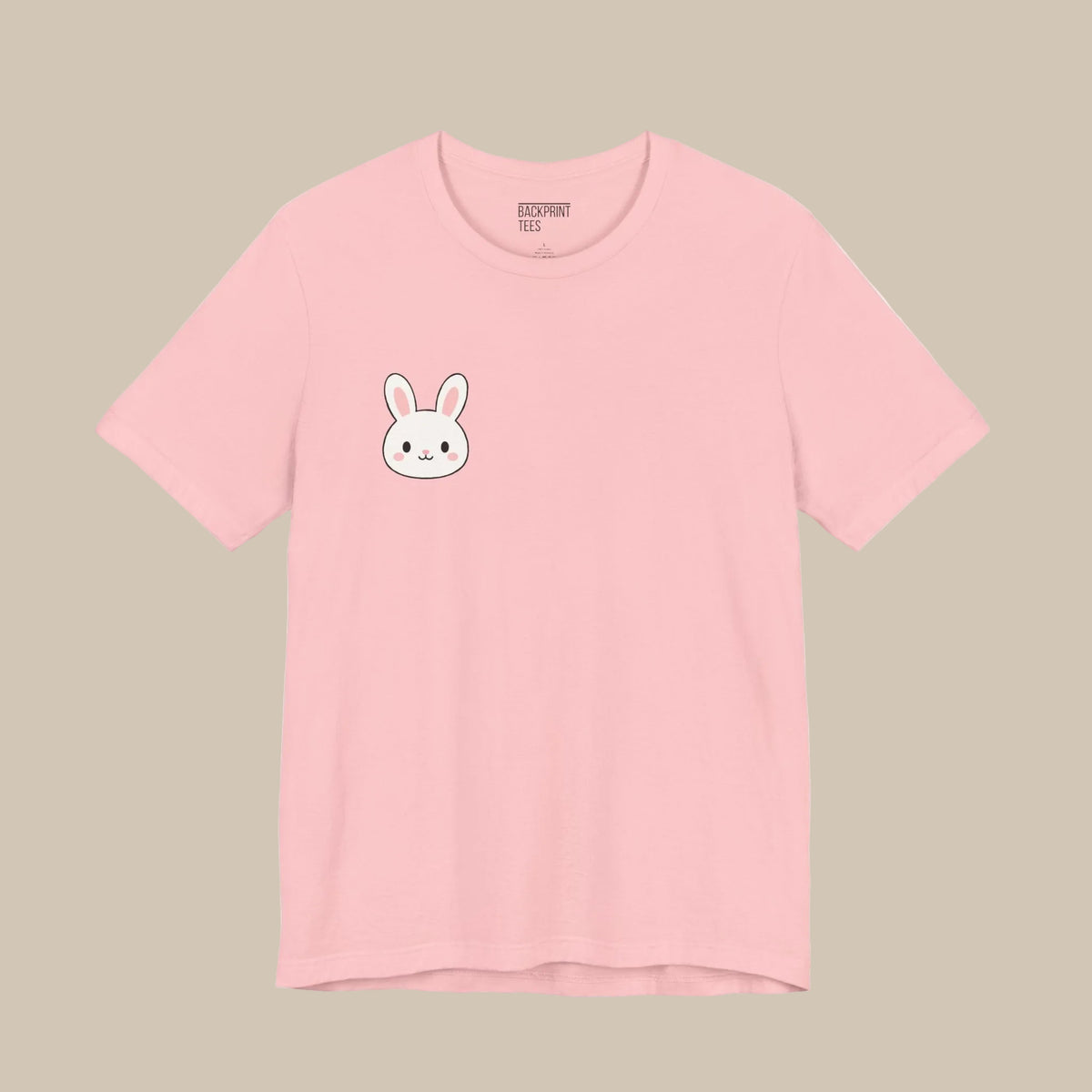 Pink backprint t-shirt with a kawaii bunny design on a pink background