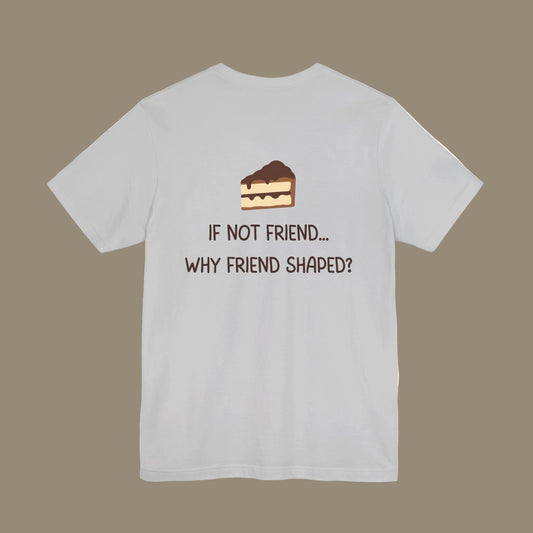 Grey t-shirt with a piece of cake graphic and text on the back against a Grey background