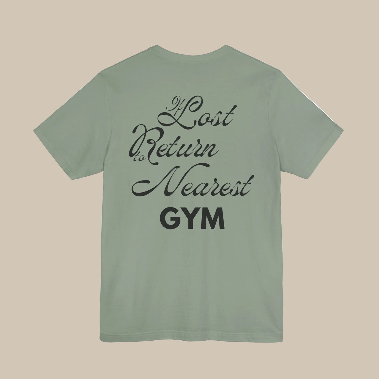 Sage green gym t-shirt with black text on the back on a green background
