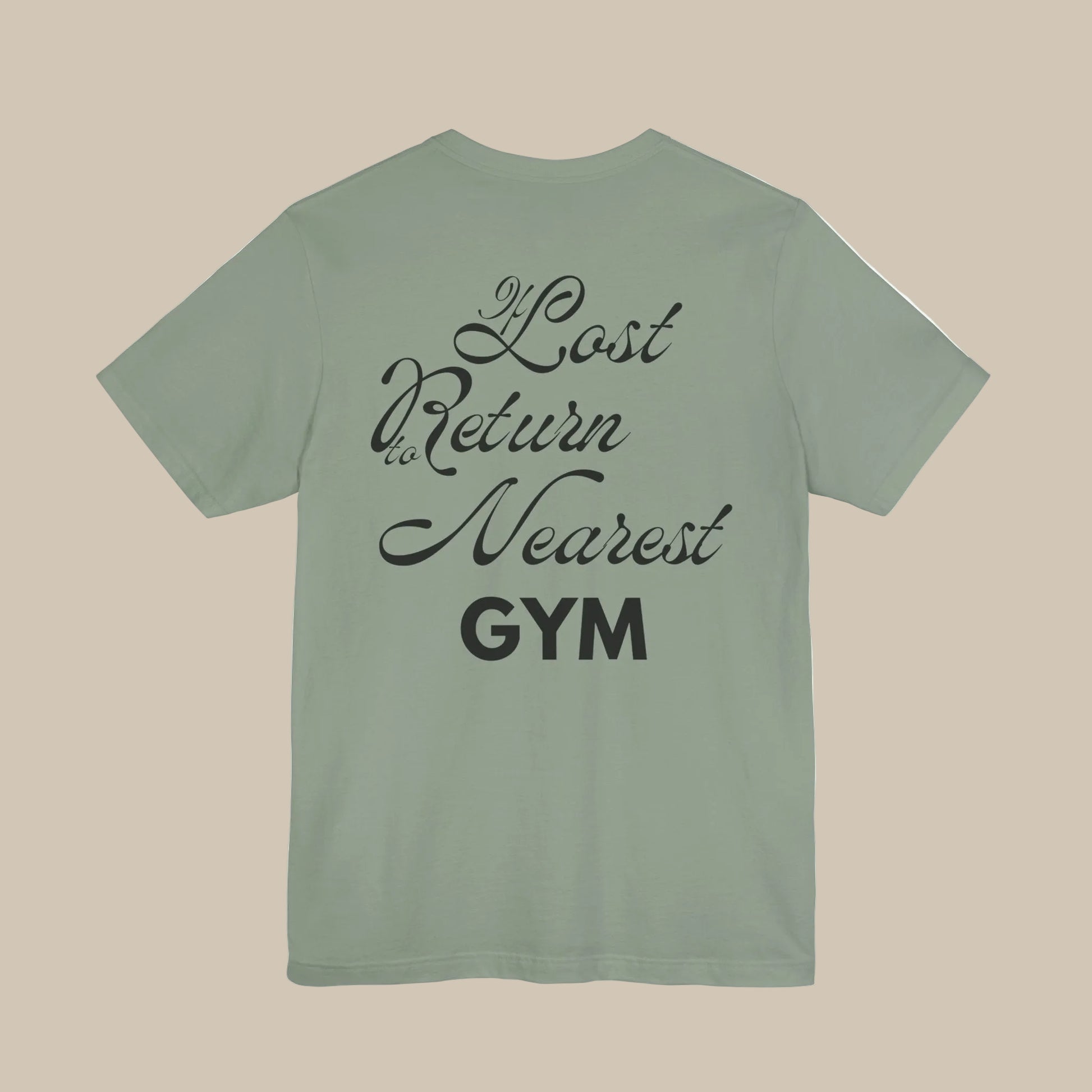 Sage green gym t-shirt with black text on the back on a green background