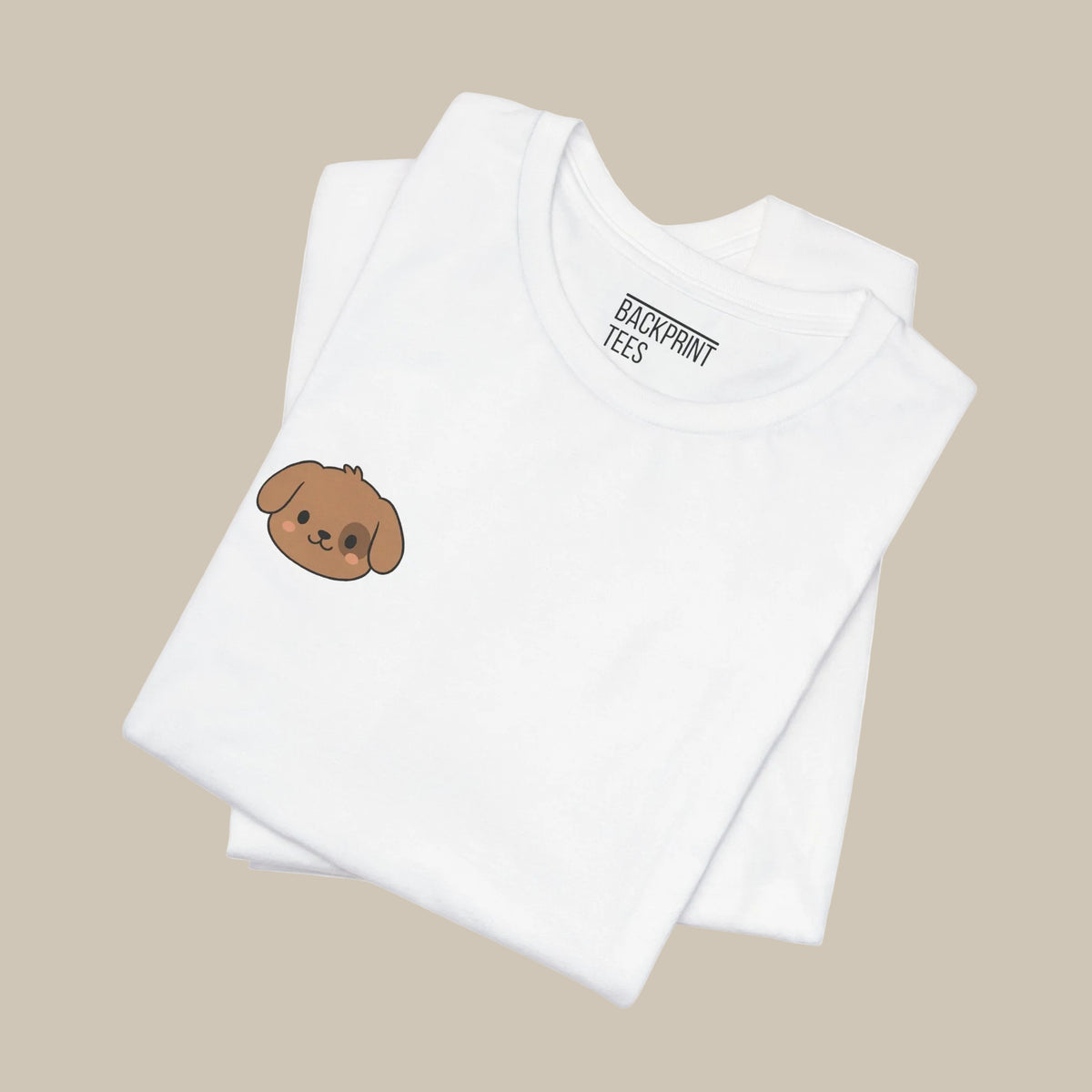 White backprint t-shirt folded with a kawaii dog graphic on a white background