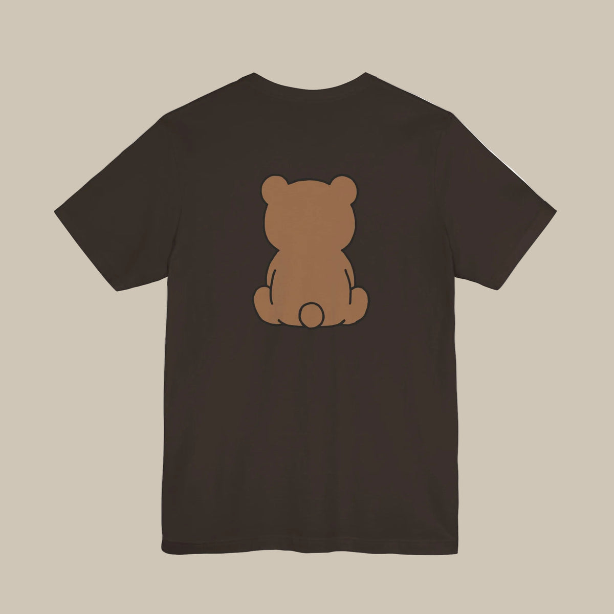 Brown backprint t-shirt with a kawaii bear graphic on a brown background