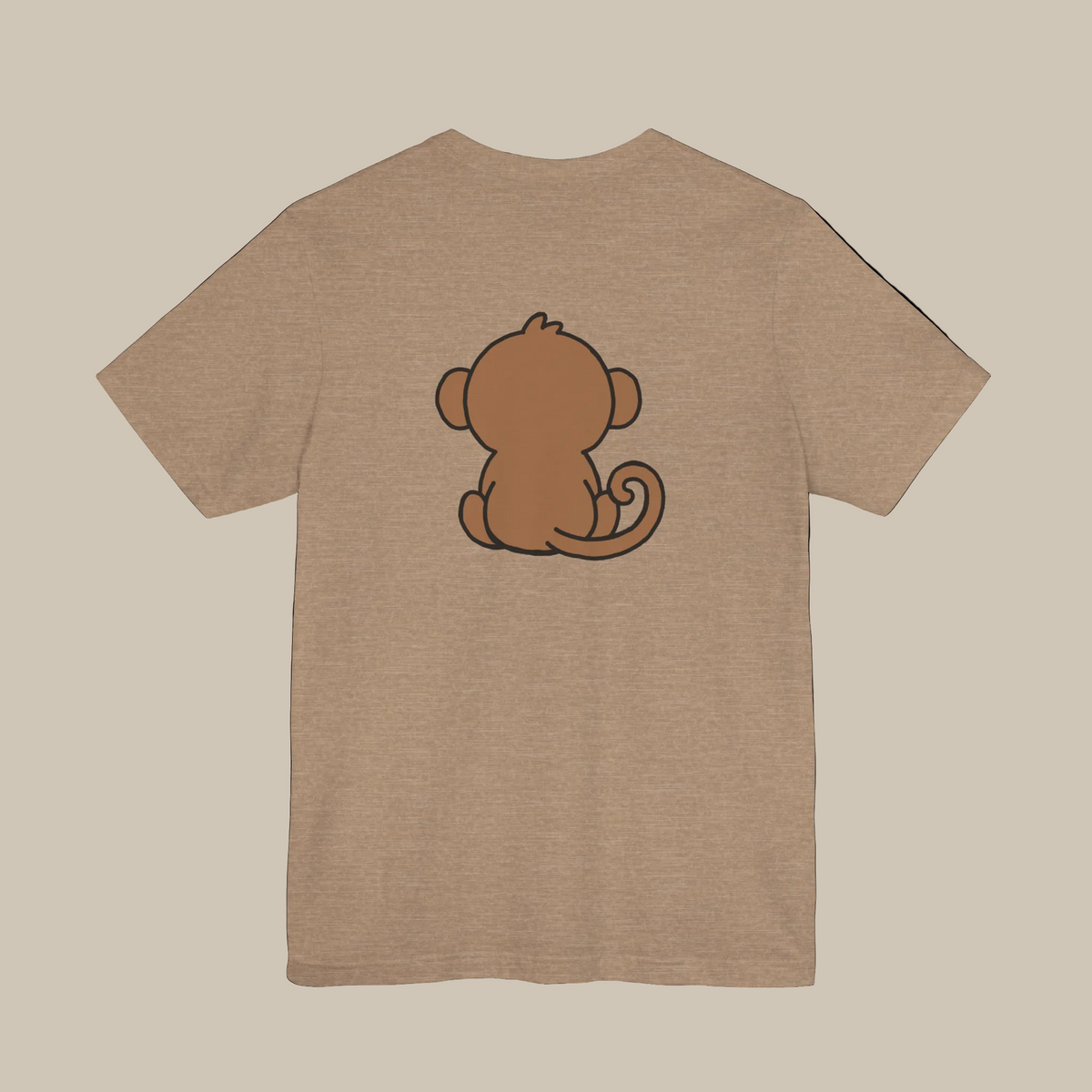 Light brown backprint t-shirt with a kawaii monkey graphic on a light brown background